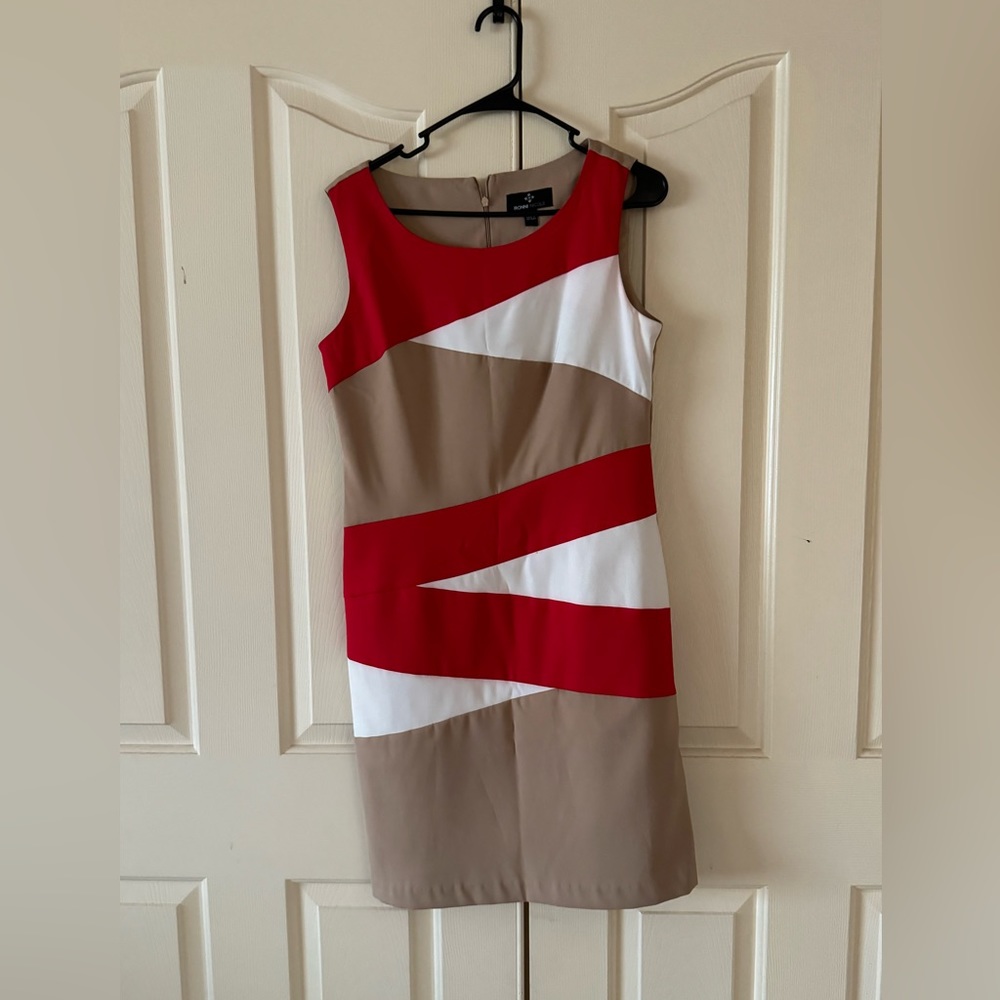 Gorgeous Ronni Nicole dress.   Perfect for the office!  No tags but never worn